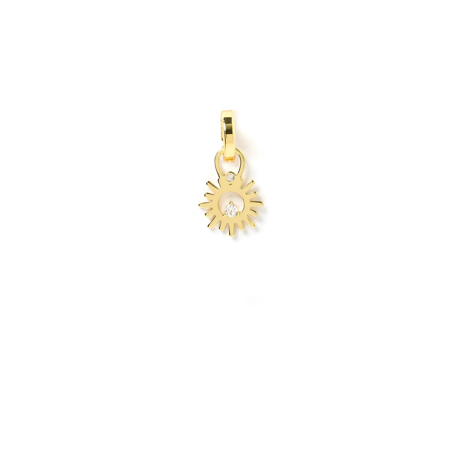 Arms Of Eve Aphrodite gold sun-shaped charm featuring a dazzling diamond at its center